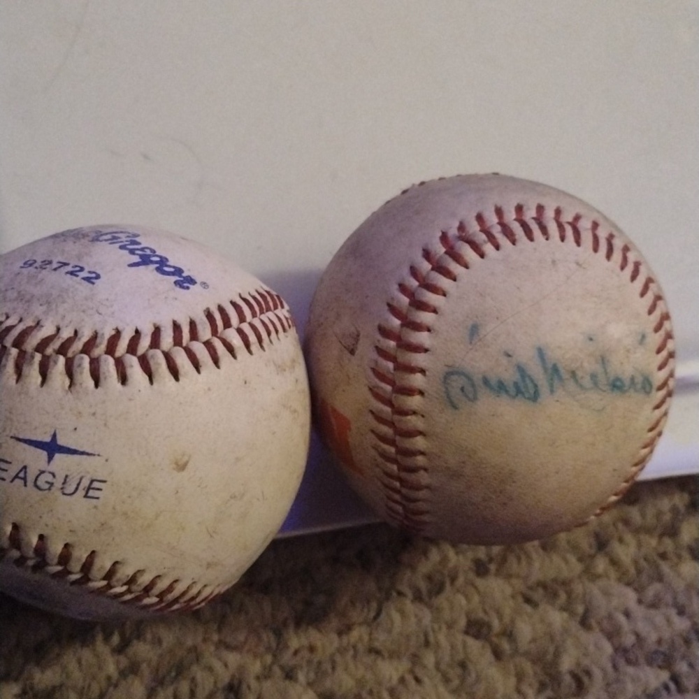 Phil Neikro Autographed Baseball and MacGregor game used Ball